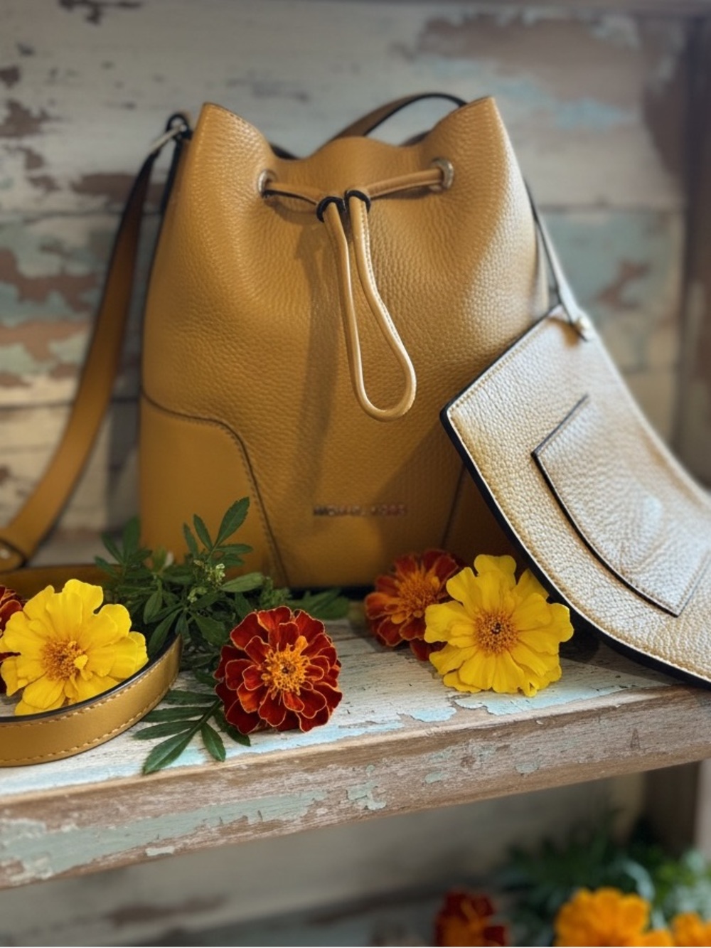 Michael Kors Cary Bucket Bag- Marigold in Pebbled Leather Drawstring Hobo
NWOT - Picture 2 of 7